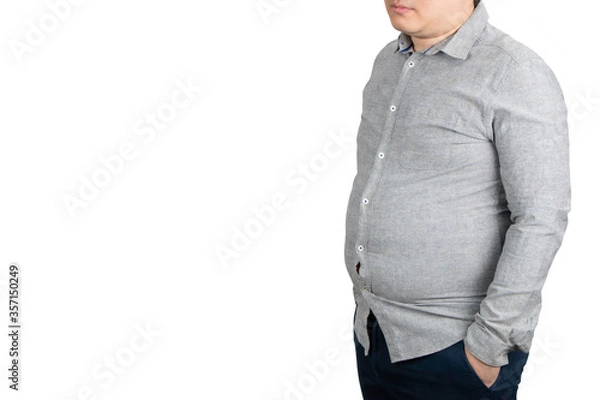 Fototapeta Close up of overweight man with a big belly on white background.	