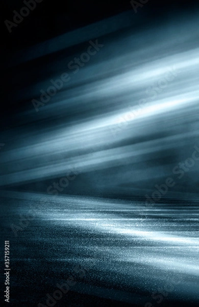 Fototapeta Dark dramatic abstract scene background. Neon glow reflected on the pavement. Smoke, smog and fog. Dark street, wet asphalt, reflections of rays in the water. Abstract dark blue background. 