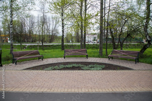 Obraz Three shops blocked by a tape due to quarantine Covid 19