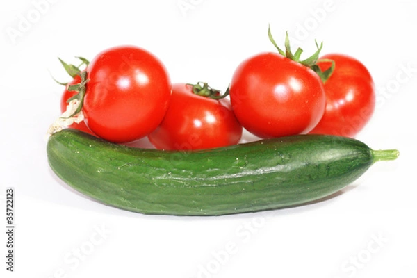 Fototapeta Fresh cucumber and tomatoes on white background