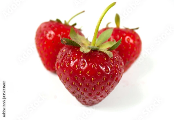 Obraz three red strawberry isolated on white background