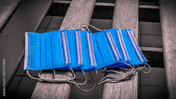 Fototapeta A set of 3ply blue color mask bought from a shop due to deficiency.