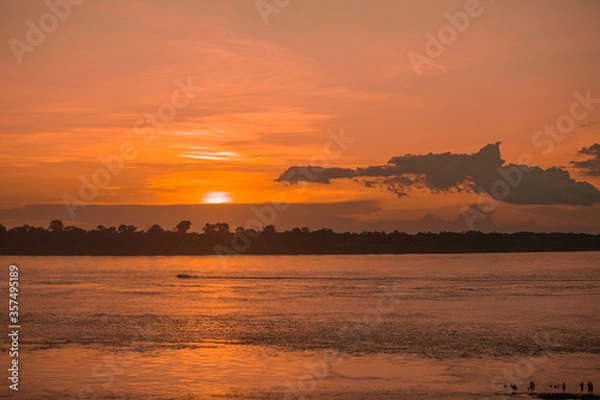 Fototapeta sunset over the river