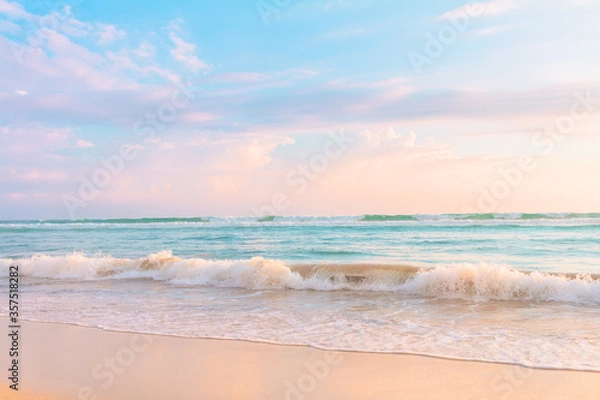 Fototapeta Soft ocean wave, blue water and beautiful cloudy sky.