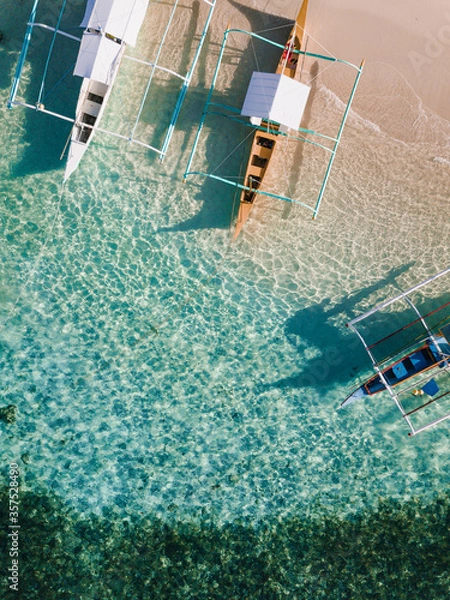 Obraz Aerial photos of Guyam Island, a tear-drop shaped island in the Philippine Sea situated around 2 kilometres south-southeast of General Luna municipality. Popular stop for tourists doing island-hopping
