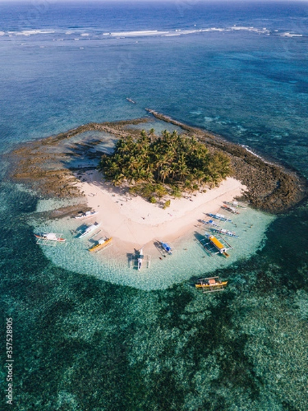 Obraz Aerial photos of Guyam Island, a tear-drop shaped island in the Philippine Sea situated around 2 kilometres south-southeast of General Luna municipality. Popular stop for tourists doing island-hopping