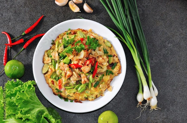 Fototapeta Shrimp omelet with Bitter bean.