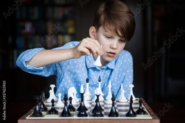 Fototapeta Chess player, smart boy. Logical thinking. Quarantine Games. Chess.