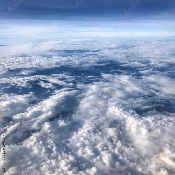 Fototapeta Beautiful view of the sky from an airplane window.