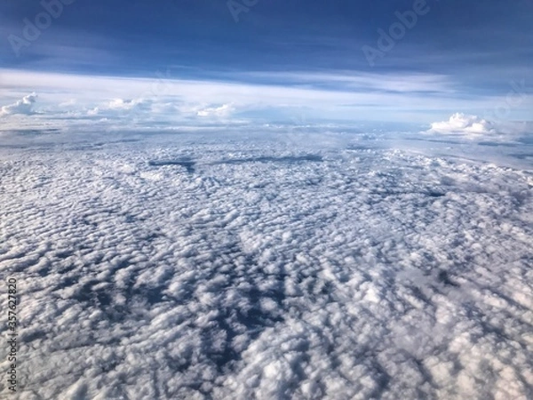 Fototapeta Beautiful view of the sky from an airplane window.