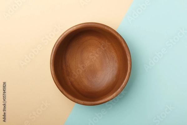 Fototapeta Empty wooden plate on paper background.