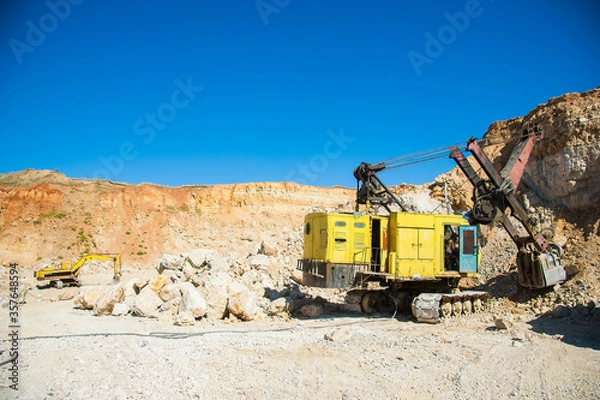 Fototapeta Production of stone at a forsaken quarry