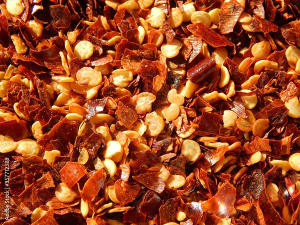 Fototapeta Close-up view of red chili flakes