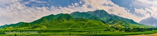 Fototapeta Panorama of a mountain valley in the summer. A fabulous mountain view of the peaks, amazing nature, summer in the mountains. Travel, tourism. beautiful background picture of nature