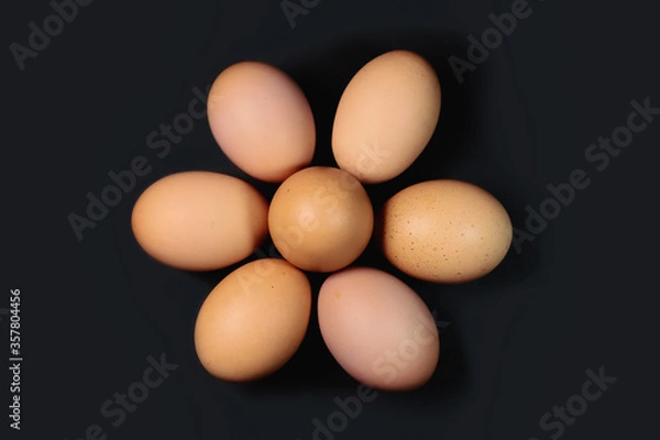 Obraz Chicken eggs on gray background