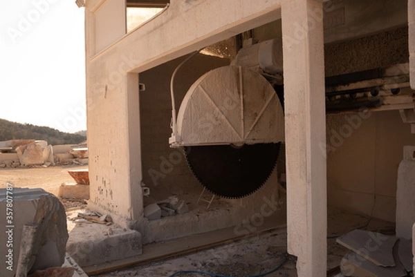 Fototapeta Huge circular saw for cutting marble in a mine