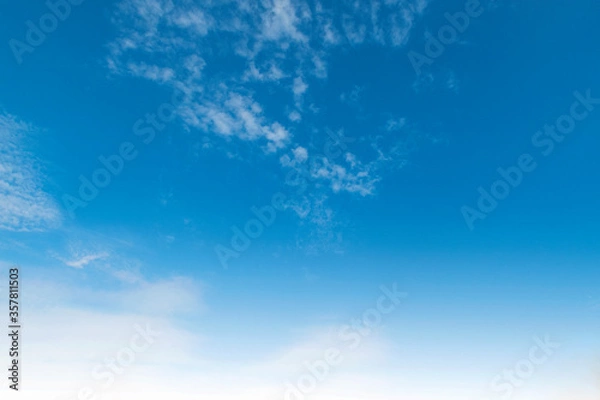 Obraz Beautiful sunny blue sky background with white clouds