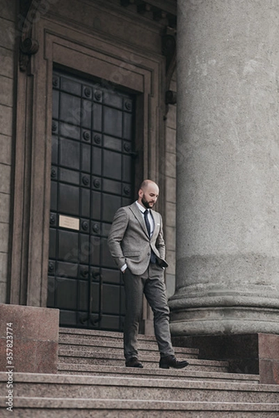 Fototapeta  portrait of a handsome man in a full suit