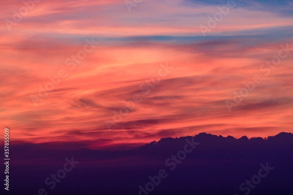 Fototapeta Red sky and clouds at sunset in the evening 
