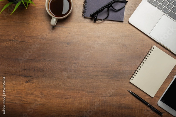 Fototapeta Flat lay of Office desk wooden table with office supplies with copy space