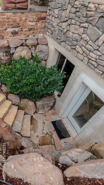 Obraz Vertical crop Steps leading down to a basement apartment