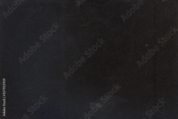 Fototapeta Black background. Velvet fleecy paper texture. Closeup