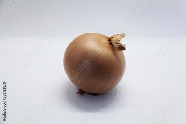 Fototapeta Onion, a very versatile vegetable that brings a multitude of options in gastronomy and has several nutrients beneficial to health.