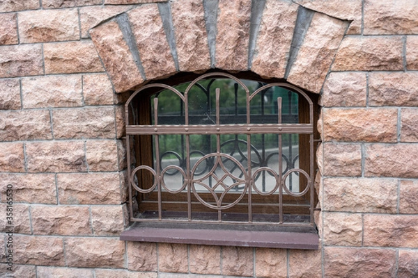 Obraz grating on a small window
