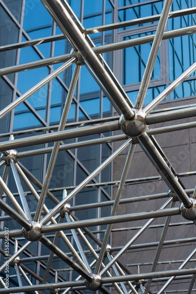 Fototapeta modern architecture, facade of the building is made of metal and glass