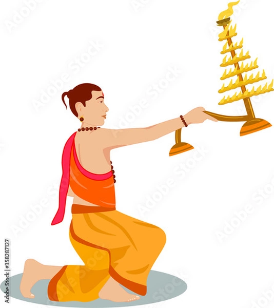 Fototapeta Creative design of the traditionally dressed Indian priest performing the prayer with big lit lamps made of the brass metal in the hand.