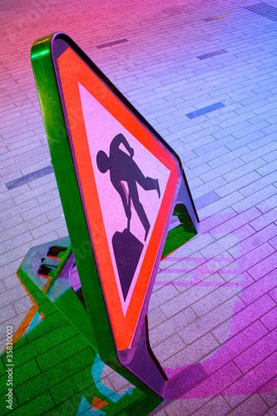 Fototapeta Colourful roadworks triangle sign; workman and shovel symbol