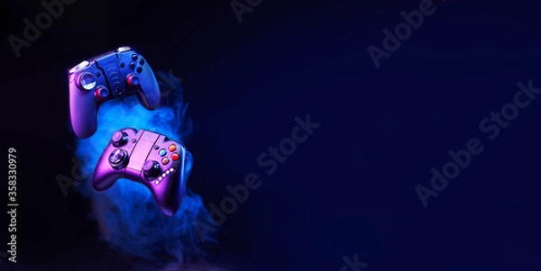 Fototapeta Levitation of two controller joysticks.