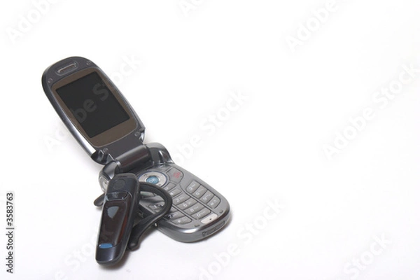 Obraz Cell phone with bluetooth headset