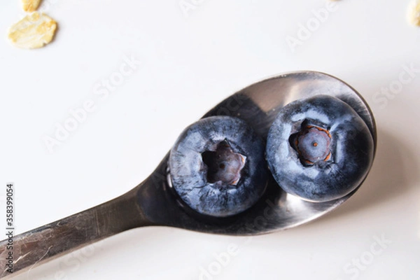 Obraz Blueberries on a vintage spoon