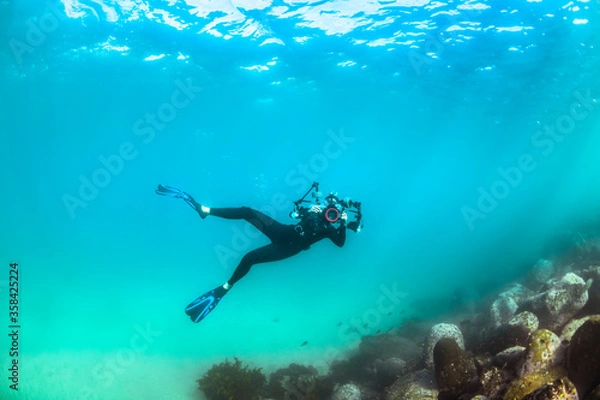 Obraz Underwater photographer 