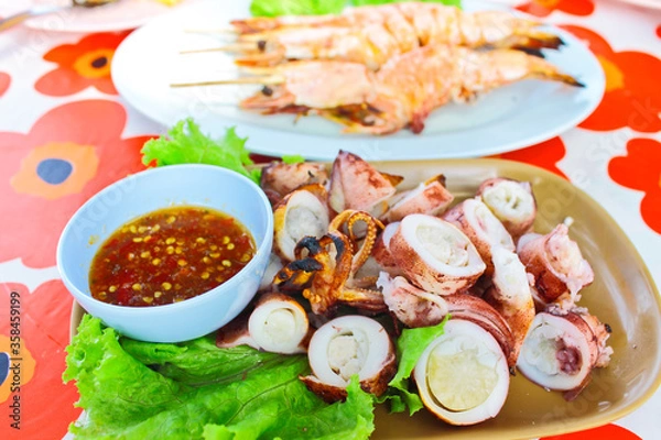 Fototapeta Chopped grill cuttlefish serve with chili-sauce and salad