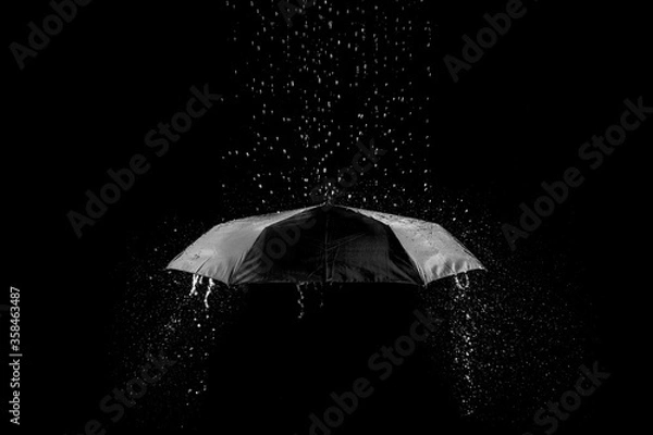 Obraz rain drop on black background