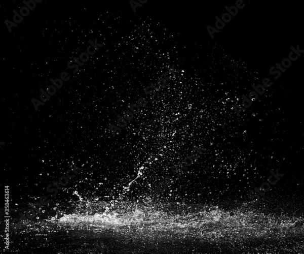 Obraz water splash on black background