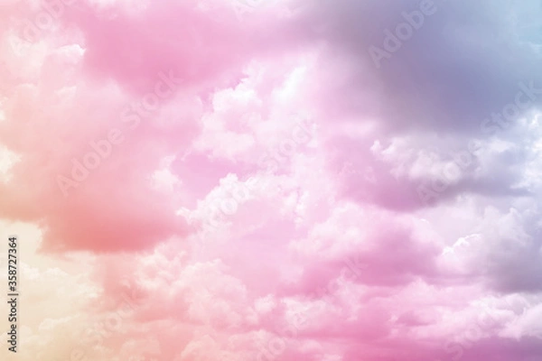 Obraz Colorful puffy fluffy cloud & cotton candy cloudscape on sunrise or sunset sky in tropical summer or spring sunlight & sun ray with gradient colors of blue, pink, purple, white & gray, surreal concept