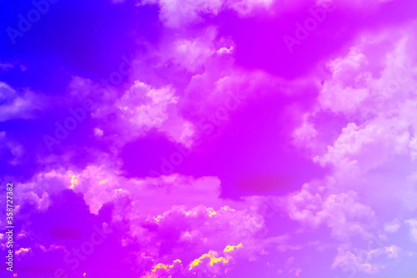 Obraz Colorful puffy fluffy cloud & cotton candy cloudscape on sunrise or sunset sky in tropical summer or spring sunlight & sun ray with gradient colors of blue, pink, purple, white & gray, surreal concept