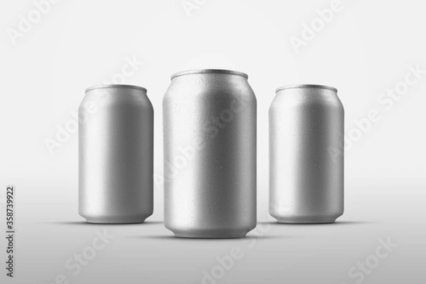 Obraz Set of small tin cans with an alcoholic drink with drops of water, a mockup standing in the background for advertising.