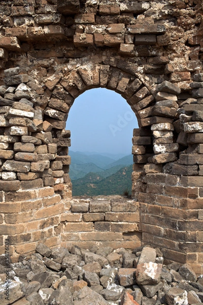 Obraz Looking out of stone brick window of Great Wall of China