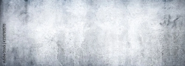 Fototapeta Texture of a grungy white concrete wall as a background or wallpaper