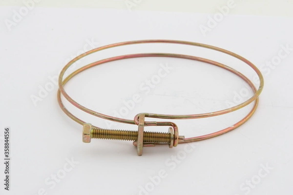 Fototapeta clamp connecting elements (staples) used for fixing and sealing the connection of hoses, pipes and other rigid and flexible pipelines. for business, on a white background, online store