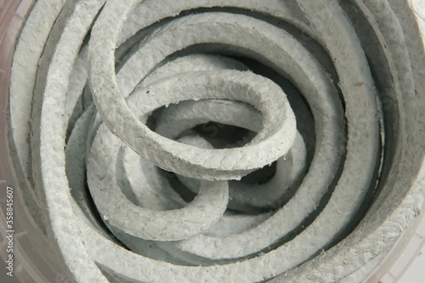 Obraz asbestos cord in packaging, for business, on a white background, online store