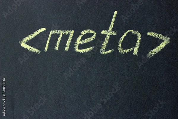 Fototapeta 
Meta - text on a chalk board. Designation of the html code part