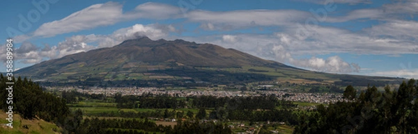 Fototapeta Panoramic photo of the city of Machachi with the background of the volcano heart in Ecuador