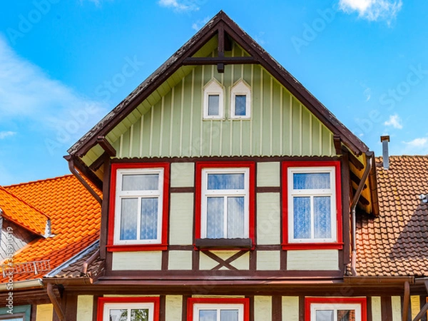 Fototapeta It's Typical colorful architecture in Wernigerode, a town in the district of Harz, Saxony-Anhalt, Germany