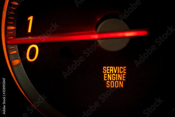 Fototapeta “SERVICE ENGINE SOON” light on dashboard of car in need of service or repair