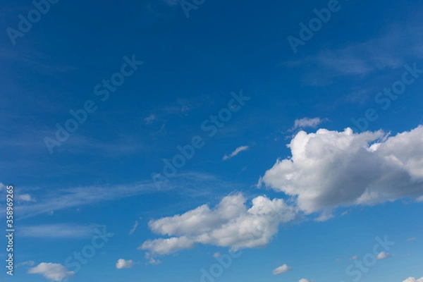 Fototapeta Gray clouds on blue sky background.